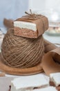Portion marshmallow with cocoa and cranberries. Wrapped in paper and tied with string. Two-layer zephyr Royalty Free Stock Photo