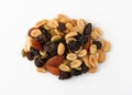 Portion of nuts and dried fruit on white background top view Royalty Free Stock Photo