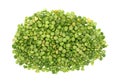 Portion of organic green split peas on white a background