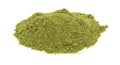 A portion of organic powdered wheat grass on a white background Royalty Free Stock Photo