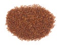 Portion of organic red quinoa on a white background