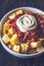 Portion of patatas bravas with sauces