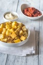 Portion of patatas bravas with sauces Royalty Free Stock Photo