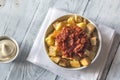 Portion of patatas bravas with sauces Royalty Free Stock Photo