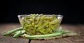 Portion of preserved Green Beans selective focus; close-up shot