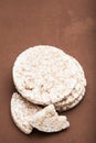 Portion of rice cookies on a brown background Royalty Free Stock Photo