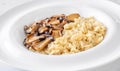 Portion risotto with mushrooms