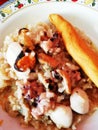 Portion risotto with seafood close up