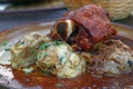 Portion of roasted pork shank with dumplings Royalty Free Stock Photo