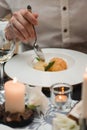 Portion of sorbet with melon balls and mint leaves served on a white platein a restaurant . Closeup Royalty Free Stock Photo