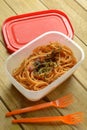 Portion of spaghetti in plastic container