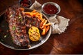 Portion of spicy barbecued spare ribs with veggies Royalty Free Stock Photo