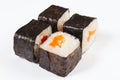 Portion of sushi with salmon on white background close up. Royalty Free Stock Photo