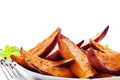 Portion of sweet potato wedges Royalty Free Stock Photo