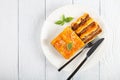 Portion of tasty lasagna on plate Royalty Free Stock Photo