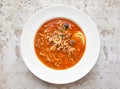 portion of tomato soup with sausage and olives Royalty Free Stock Photo
