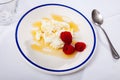 Portion of tradicional Catalan dessert, mato with honey