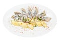 Portion of typical Dutch herring on the plate Royalty Free Stock Photo