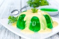 Portion of Woodruff Jelly with Vanilla Sauce