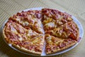 a portioned pizza on a plate Royalty Free Stock Photo