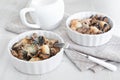 Portions of baked tuna with mushrooms
