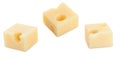 Portions cubes, dice of Emmental Swiss cheese. Texture of holes and alveoli. Isolated.