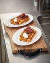 Portions of savory waffles with beef briskets Royalty Free Stock Photo