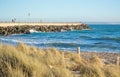 Portixol pier beach grass sand