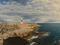 Portland Bill Lighthouse. Dorset coast in Isle of Portland, UK. A waymark guiding vessels navigating in the English Channel Royalty Free Stock Photo