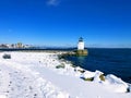 The Portland Breakwater Light in winter after snow