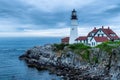 Portland Head Lighthouse at morning with stormy dramatic sky