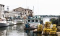 Portland Maine canal with fishing boats and lobster traps Royalty Free Stock Photo