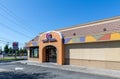 Exterior of Taco Bell fast-food restaurant with sign and logo Royalty Free Stock Photo