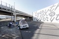 PORTLAND, OR, USA - AUG 25, 2019: Homeless camps with tents and tarp shelter under a bridge in downtown Portland Oregon.