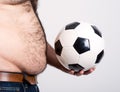 Portly belly of a man football Royalty Free Stock Photo