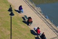 Porto Alegre, Rio Grande do Sul,Brazil : loving couples resting near the lake Guaiba Royalty Free Stock Photo