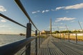 Porto Alegre, Rio Grande do Sul, Brazil, March 29 - 2021: Beautiful sunset on the edge of GuaÃÂ­ba, Gasometro at golden hour Royalty Free Stock Photo