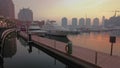 Porto Arabia Marina in The pearl Doha, Qatar sunset summer shot showing luxurious yachts and boats docked at the marina