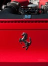 Red ferrari 458 italia engine detail logo Royalty Free Stock Photo