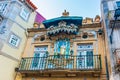 Facades of buildings and Virgin Mary in Porto Portugal Royalty Free Stock Photo