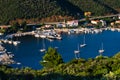 Porto Koufo harbor with a lot of anchored sailboats at sunset, west coast of Sithonia