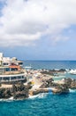 Porto Moniz, Madeira, Portugal - Sep 13, 2019: Natural swimming pools in the Atlantic ocean. Surrounded by rocks from the open sea Royalty Free Stock Photo