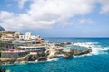 Porto Moniz, Madeira, Portugal - Sep 13, 2019: Natural swimming pools in the Atlantic ocean waters. Surrounded by rocks from the Royalty Free Stock Photo