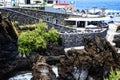 Porto Moniz on the North West Coast where the Mountains in the north of the Island of Madeira meet the Atlantic Ocean Royalty Free Stock Photo