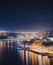 Porto night cityscape at Douro river top view