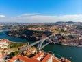 Porto Old Town and Dom Luis Bridge over the Douro river in Porto, Portugal, aerial view.