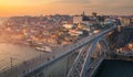 Porto panoramic aerial view of Dom Luis Bridge at sunset. Porto, Portugal. Cityscape of Porto downtown touristic Ribeira