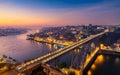 Porto panoramic aerial view of Dom Luis Bridge at sunset. Porto, Portugal. Cityscape of Porto downtown touristic Ribeira