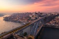 Porto panoramic aerial view of Dom Luis Bridge at sunset. Porto, Portugal. Cityscape of Porto downtown touristic Ribeira