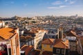 Porto panoramic landmark with boats river Douro. Old buildings with brick roofs by river Douro in Porto, Portugal. Royalty Free Stock Photo
